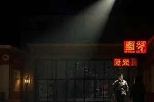 《两公里之外》封面：夜跑者与远处连排路灯